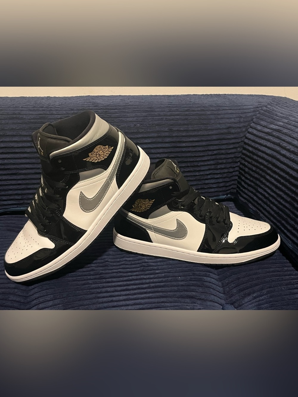 Jordan High-Top Sneakers in Black, White & Gray with Gold Wings